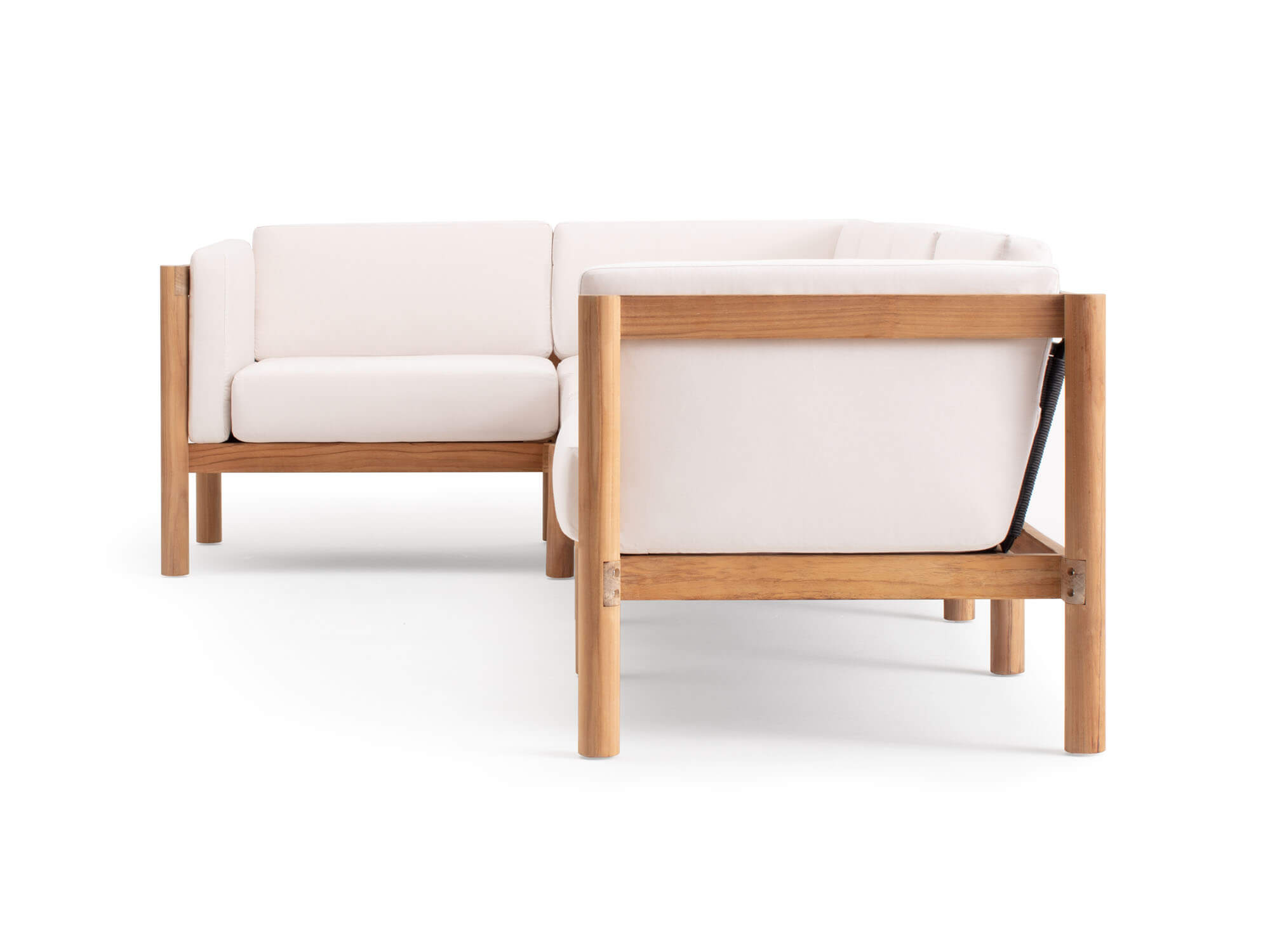 Side view of 5-piece outdoor sectional with white arm cushions